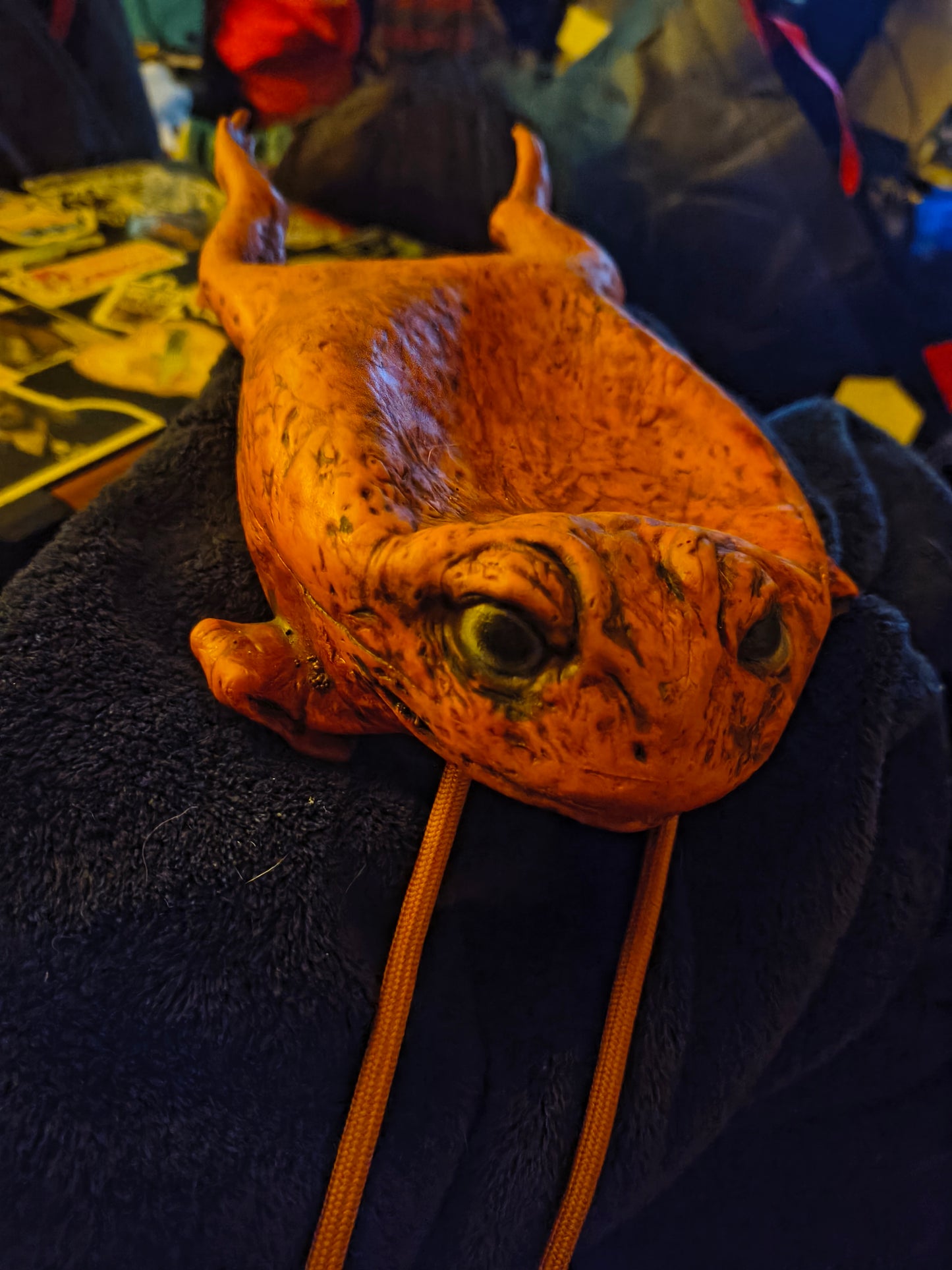 A dumb rubber toad purse